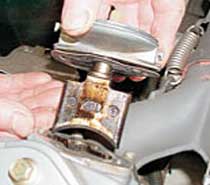 Snowmobile Exhaust Power Valve with Deposit Build-Up